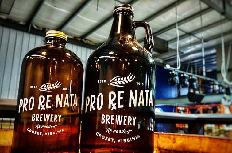 Two growlers of fresh beer made at Pro ReNata Brewery.