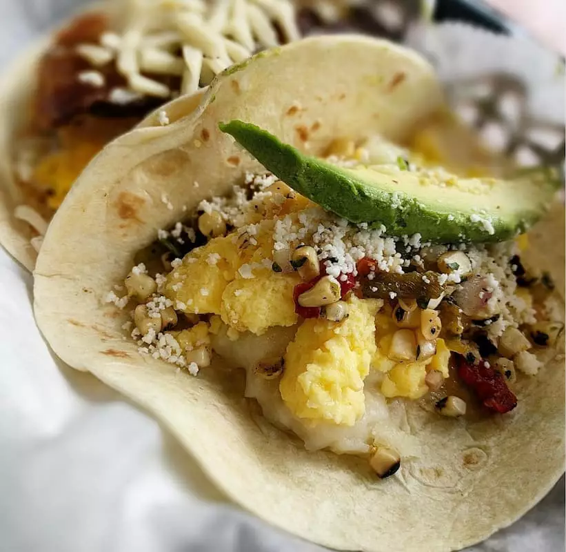 Breakfast Taco with Egg, Avacado, and Potatoes from Brazos Tacos