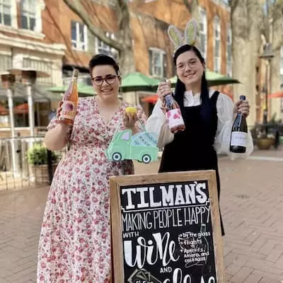 Two women visiting Tilman's while enjoying their day on the Downtown Mall.